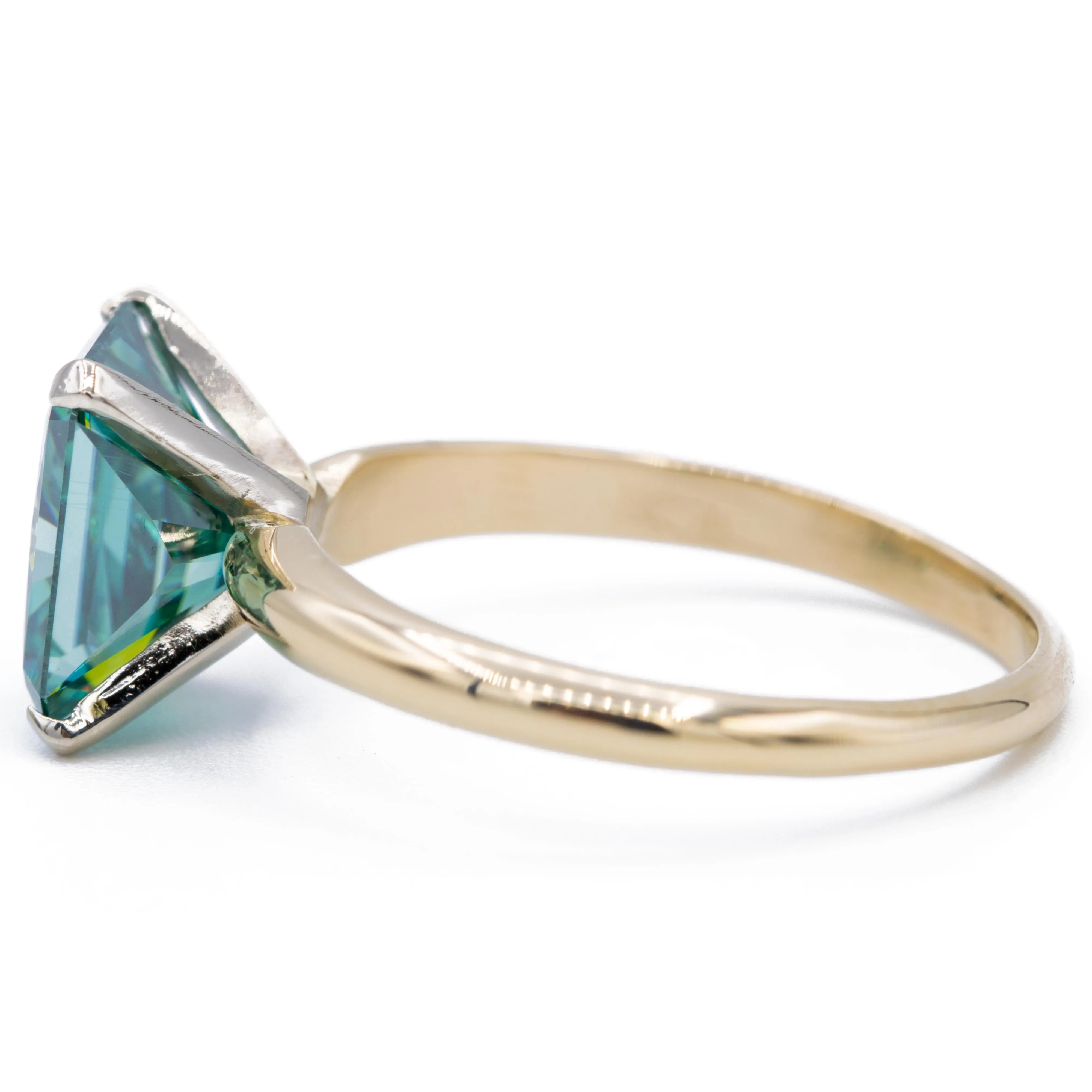 9x7mm Medium Light Emerald Green Radiant Moissanite 14KY and 14KW Two-Tone Solitaire Ring